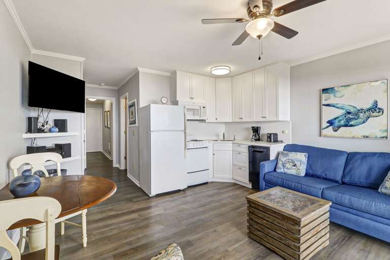 Welcome to this inviting villa with its open floor plan with new paint and flooring.  