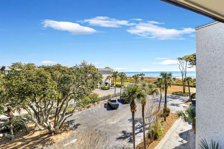 Balcony off living room with view to the water