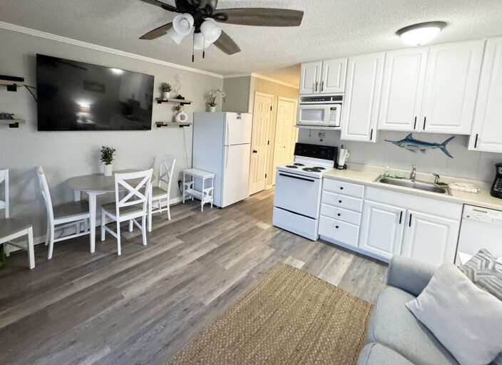 Interior Of A Vacation Rental Living Room With Kitchenette