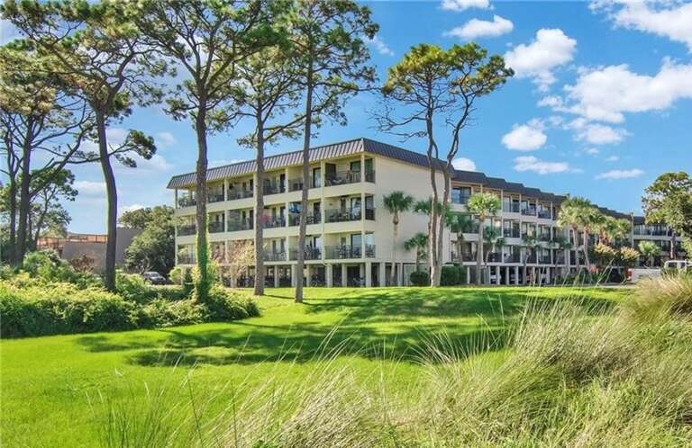 Building Surrounded By Greenery With Balconies Building Surrounded By Greenery With Balconies