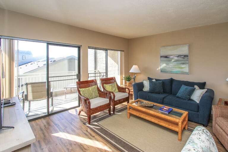 Living Room Interior With Furniture And Balcony Access