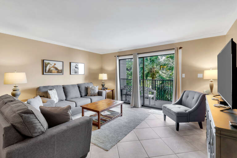 Living Room Interior With Furniture And Balcony Access