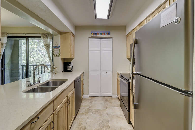 galley kitchen that opens to the dining area.  Recently renovated.   galley kitchen that opens to the dining area.  Recently renovated.