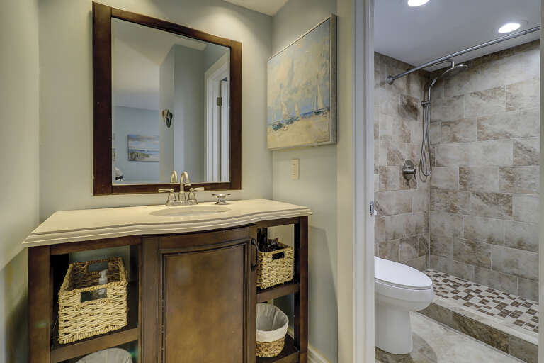 lovely updated bathroom with walk in shower.   lovely updated bathroom with walk in shower.