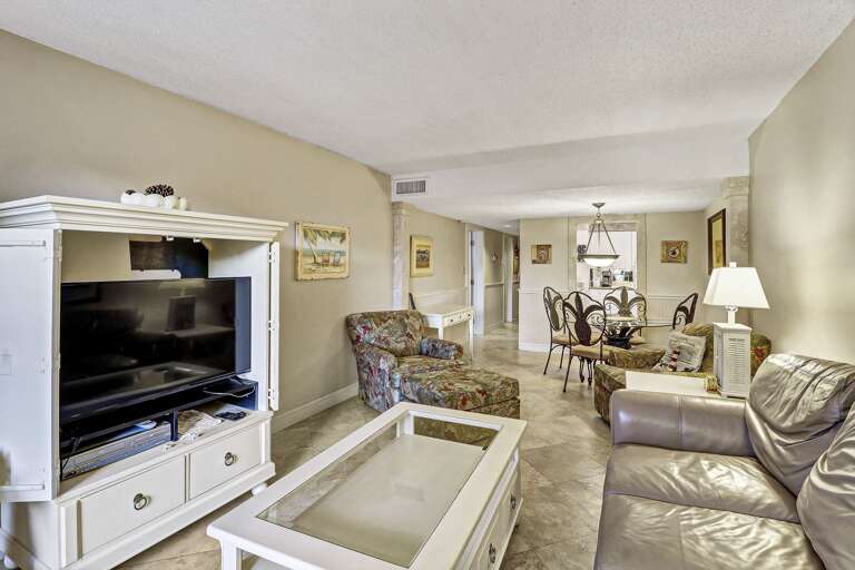 Enjoy your favorite shows or movies on the large flat screen TV in the living room.