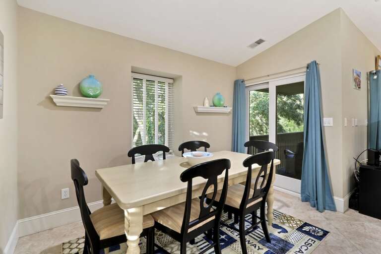 Dining room has easy access to outdoor deck.  
