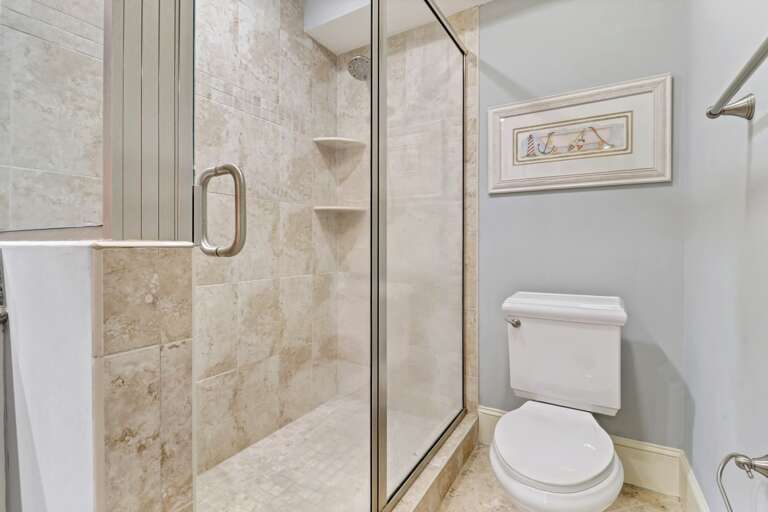 Renovated, large tiled walk-in shower. 
