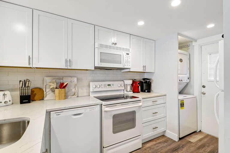The newly renovated completely furnished Kitchen features all stainless steel appliances, beautiful granite counters. 