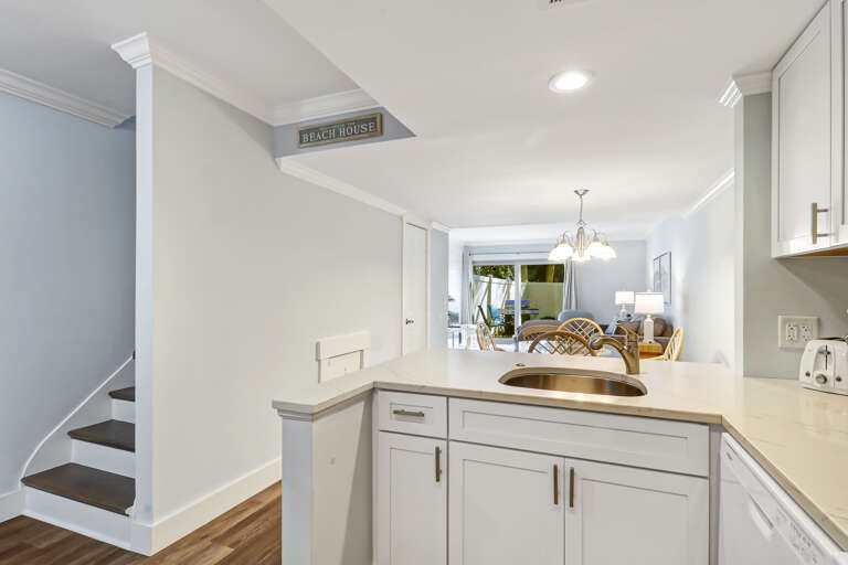 The newly renovated completely furnished Kitchen features all stainless steel appliances, beautiful granite counters.  Dining table seats four. 