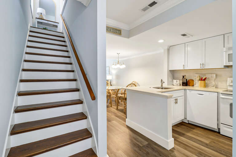 The newly renovated completely furnished Kitchen features all stainless steel appliances, beautiful granite counters.  Dining table seats four. 