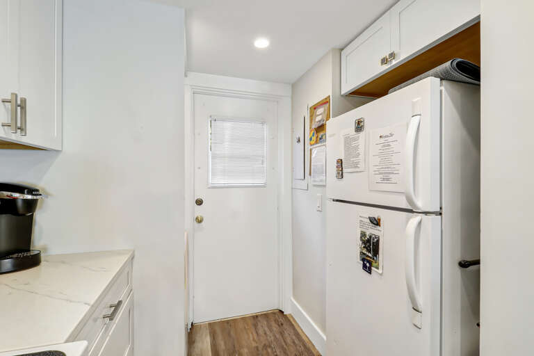 The newly renovated completely furnished Kitchen features all stainless steel appliances, beautiful granite counters.  