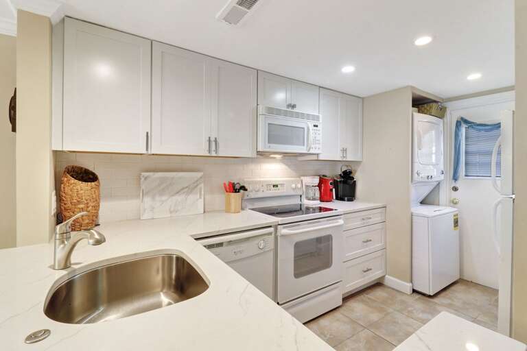 Laundry facilities off the kitchen.   Laundry facilities off the kitchen.