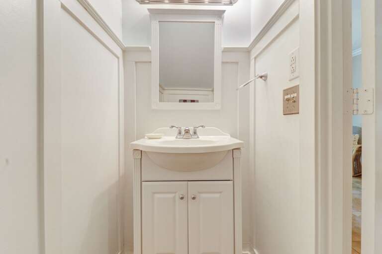 Convenient 1st floor powder room.   Convenient 1st floor powder room.