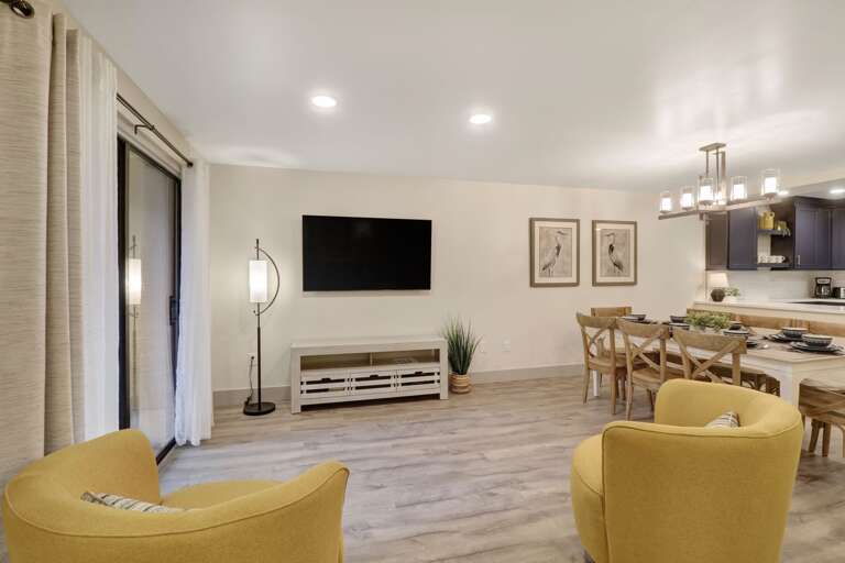 Plenty of space to watch the new 60" TV in this beautiful living area.  