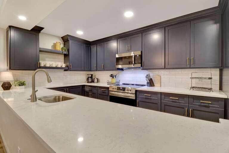 Beautiful renovated kitchen.  Who wouldn't want to cook in this gorgeous space!  