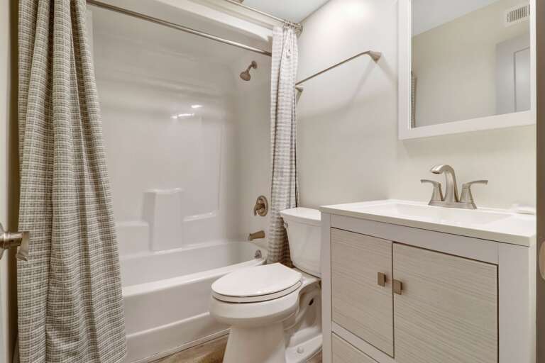 Tub/shower combination in this elegant renovated 3rd bathroom.  