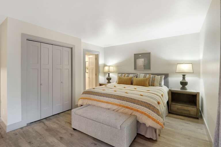 You will get a great night's sleep in this lovely renovated master bedroom with king sized bed and full sized closet.  
