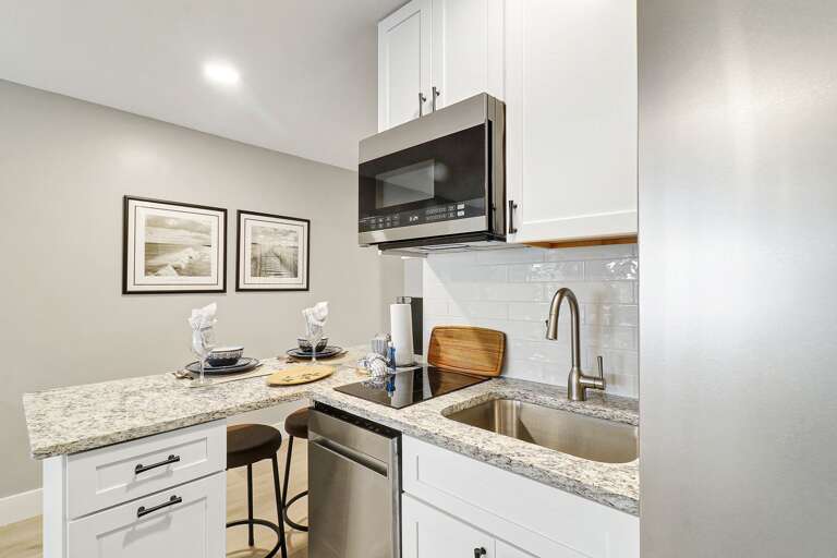 Two Burner cooktop, Fridge, Kuerig, microwave, dishwasher