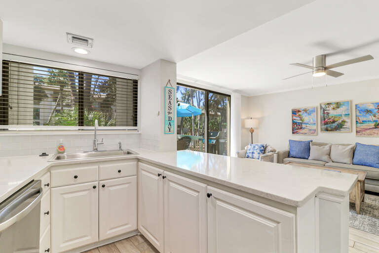 The kitchen features a granite countertop with lots of space for cooking!
