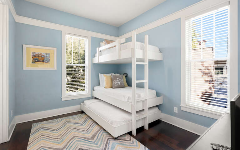 Your kids will love their bright bedroom with custom bunk bed and trundle, perfect for sleepovers and adventures.