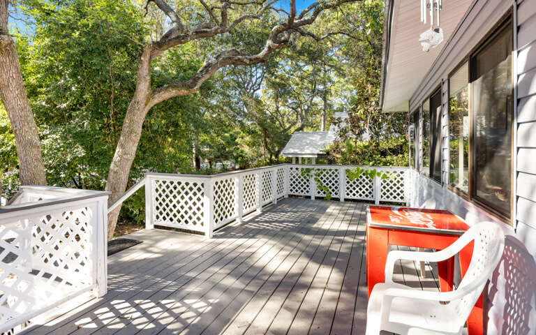 Vacation Rental Veranda Veiled By Vibrant Verdure