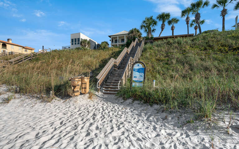 Beach access just steps away from pristine white sand.