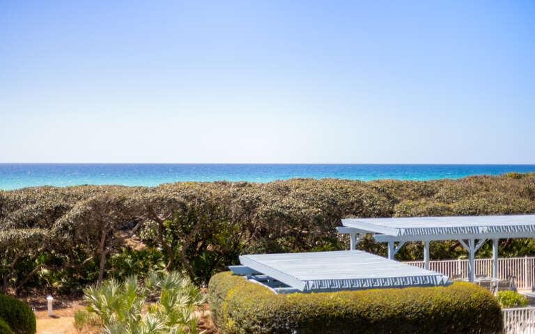 Coastal property with direct sea access features panoramic ocean views and lush native vegetation creating a natural backdrop.