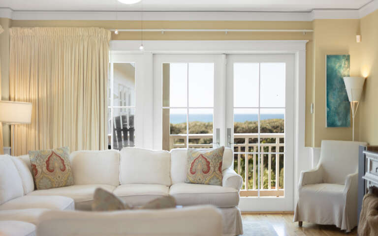 Relax in your bright living space with stunning ocean views through French doors opening to your private balcony.
