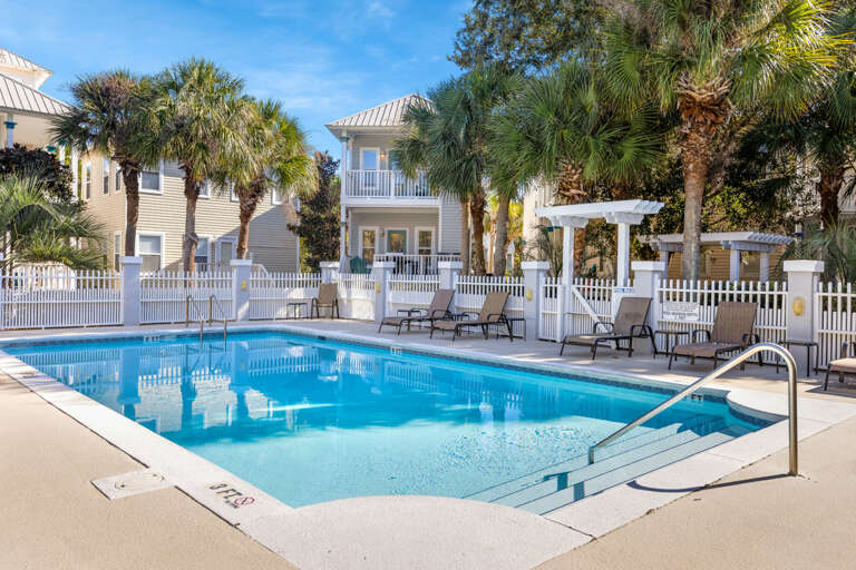Palm-lined Pool At Sunny Vacation Rental