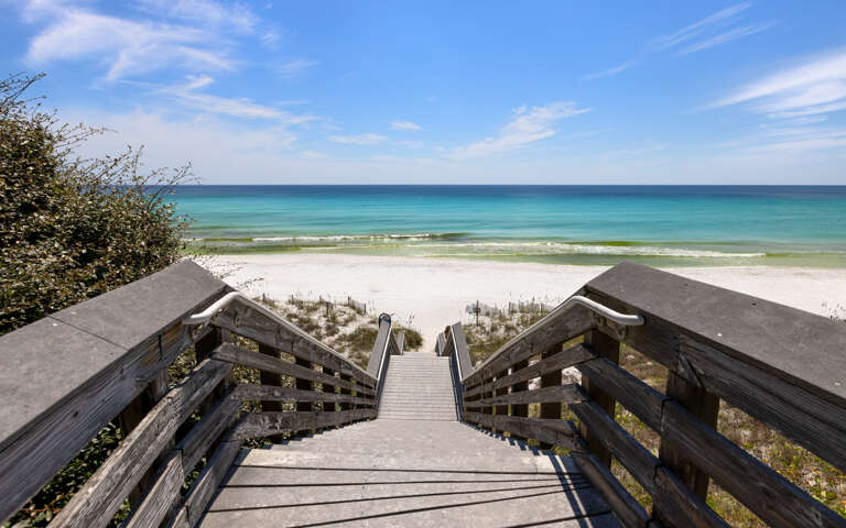 Wooden Walkway Winding To White Beach, Blue Sea Beckons