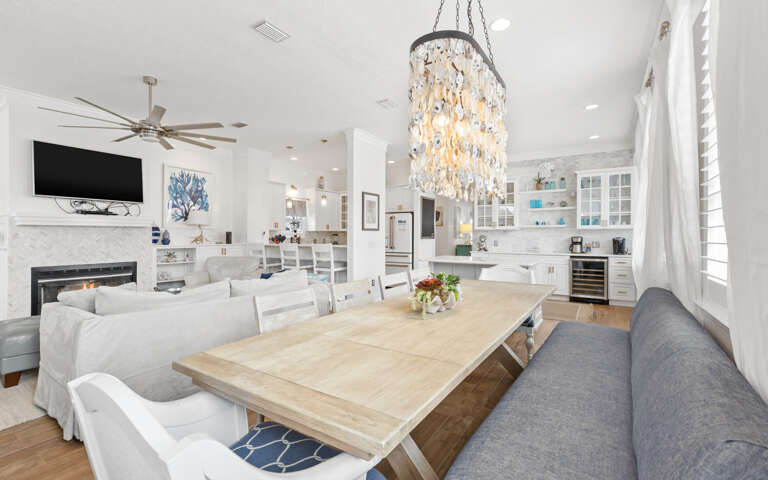 Interior Living Space With Dining Table And Kitchen