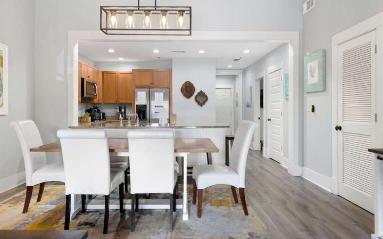 Vacation Rental Interior With Dining Table And Kitchen