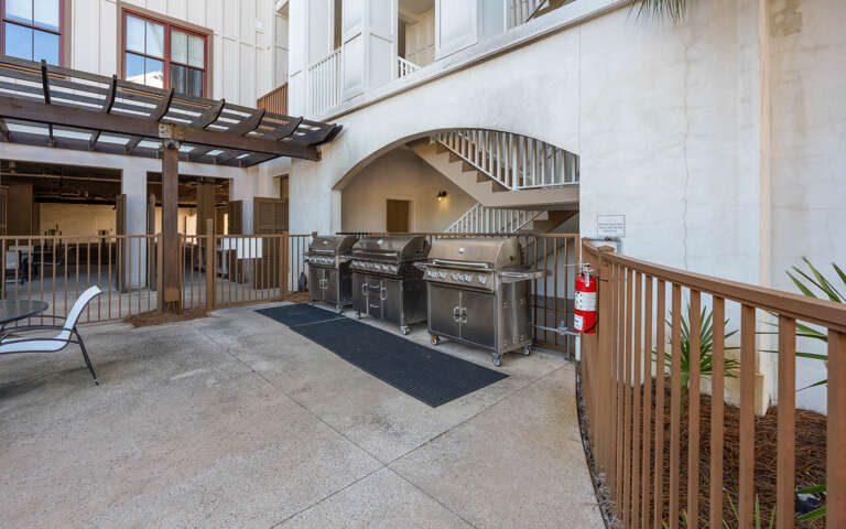 Fire up the premium stainless steel grills for your perfect outdoor feast in this beautifully designed courtyard BBQ area.