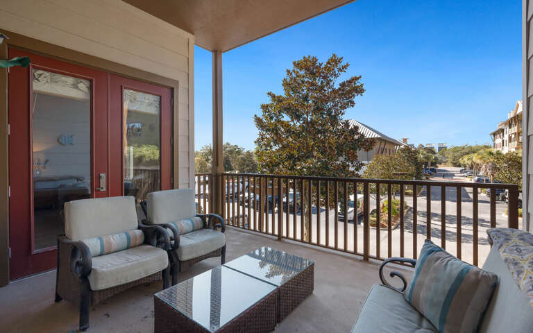 Unwind on your private balcony with plush seating and sweeping views—perfect for morning coffee or evening relaxation.