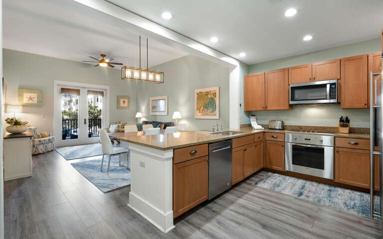 Your open-plan kitchen flows seamlessly into the living area, creating the perfect space for cooking and entertaining together.