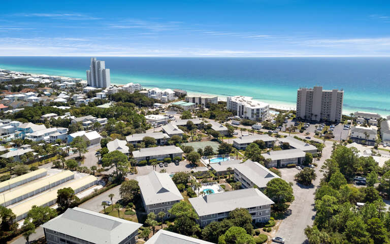 Coastal community with pristine beaches and turquoise waters.