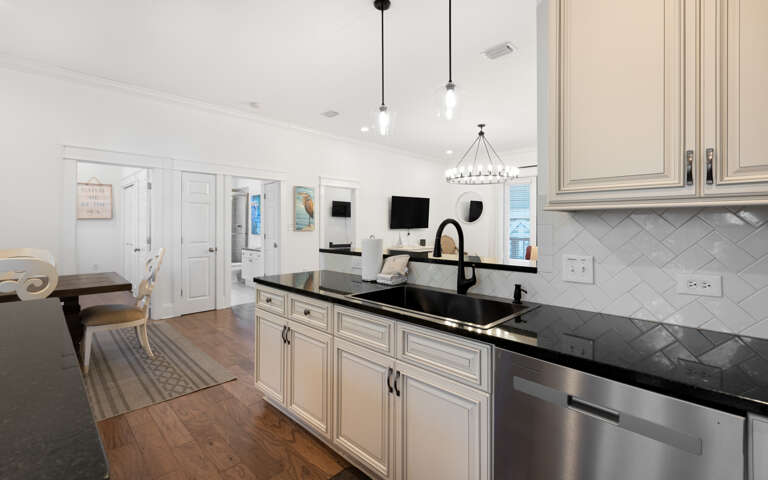 Your gourmet kitchen features elegant granite counters, custom cabinetry, and premium appliances for memorable meal prep.