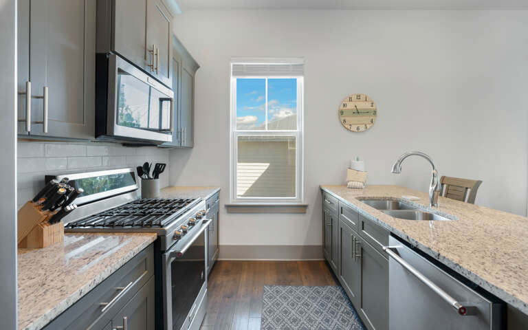 Cook your favorite meals in this fully equipped kitchen with granite counters, gas range, and dishwasherâeverything you need for a perfect stay.