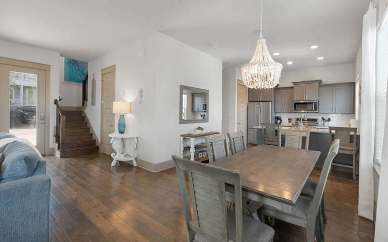 Your open-concept living space flows seamlessly from kitchen to dining, perfect for gathering and creating memories together.