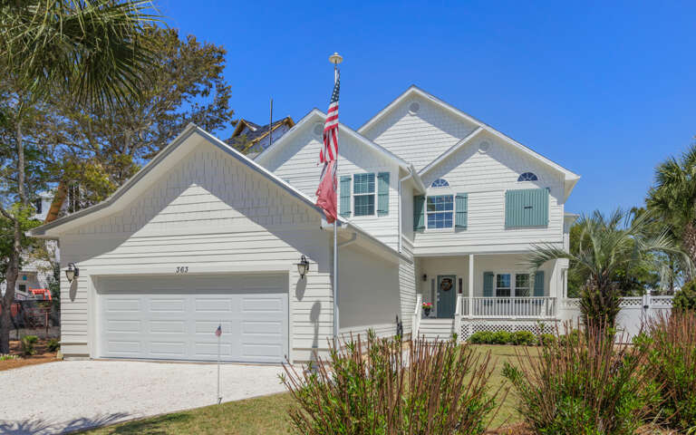 Suburban Two-story House With American Flag