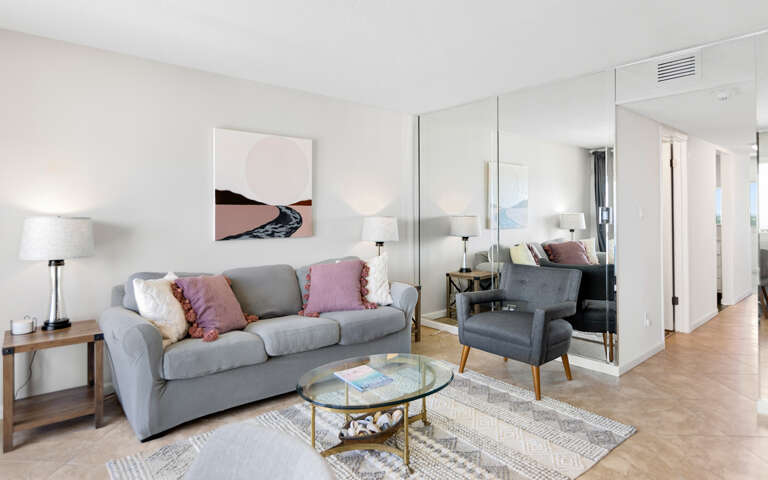 Living Room With Sofa, Chairs, And Coffee Table