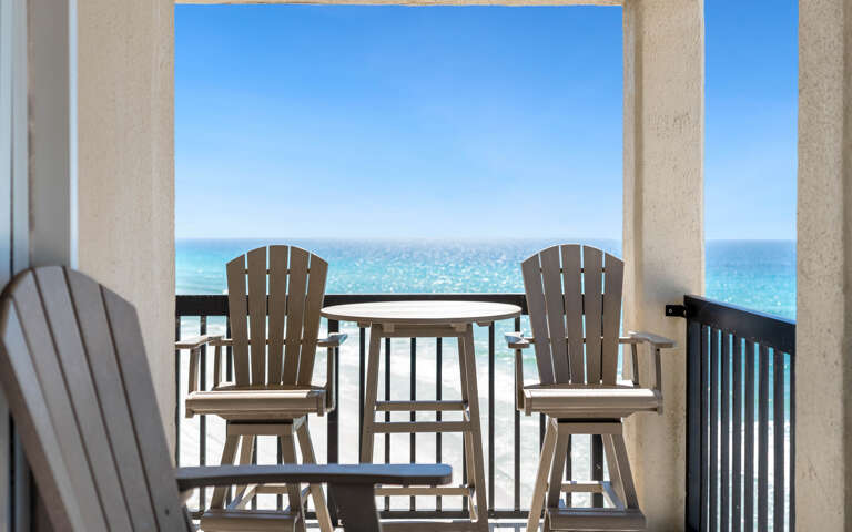 Step onto your private balcony and sink into comfortable chairs with morning coffee as endless turquoise waters sparkle before you.