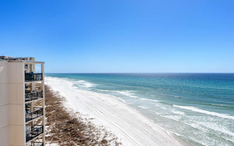 Stunning gulf front location with pristine white sand beaches and crystal-clear turquoise waters stretching to the horizon.