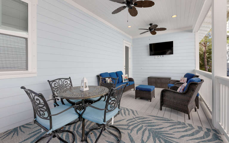 Relax on your private covered porch with comfy seating, ceiling fans, and entertainmentâperfect for morning coffee or evening unwinding.