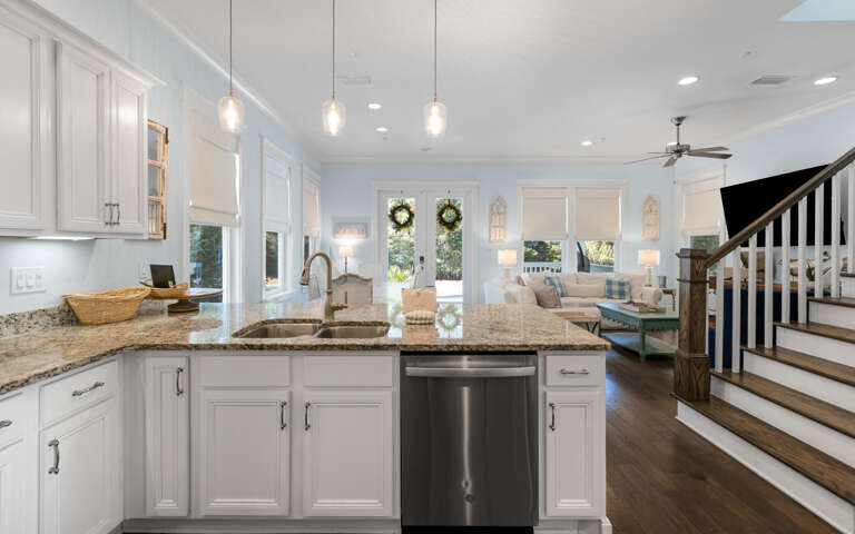 Step into your bright, open-concept haven where granite countertops and modern appliances make cooking a joy while you stay connected to loved ones.