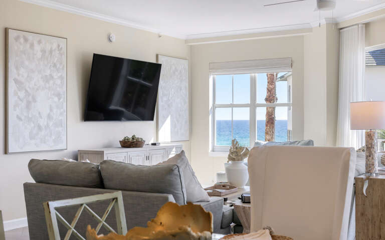 Living Room Interior With Sofa, Art, And Ocean View