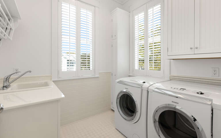 Your private laundry room offers convenience with modern washer and dryer, plus a utility sink for all your cleaning needs.