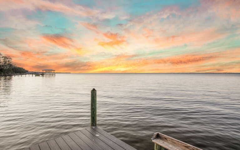 Lake Pier At Sunset