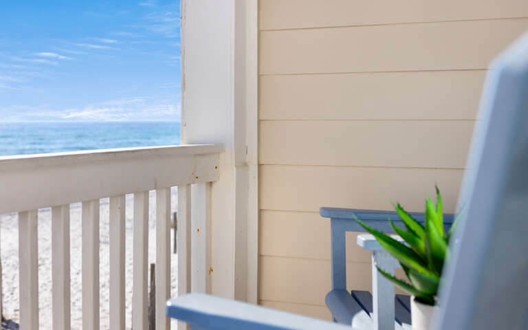 Your private balcony overlooking endless gulf waves creates the perfect spot for morning coffee and peaceful moments.