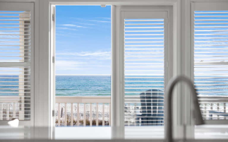 Wake up to breathtaking ocean views through your private balcony doors. The endless blue horizon awaits just steps from your bed.